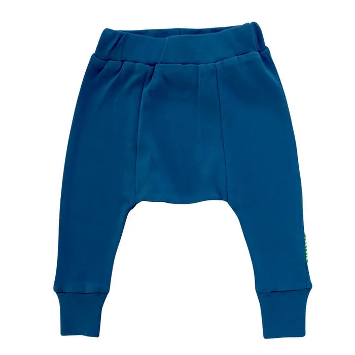 Parade Organics cotton baby harem pants in solid blue displayed flat on a white background.