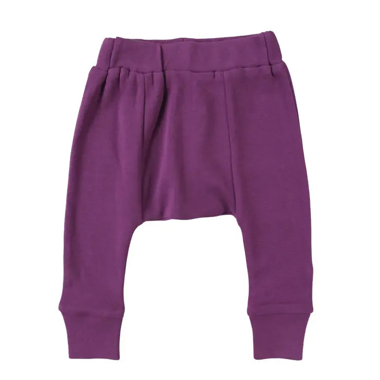 Parade Organics cotton baby harem pants in purple shown flat on a white background.