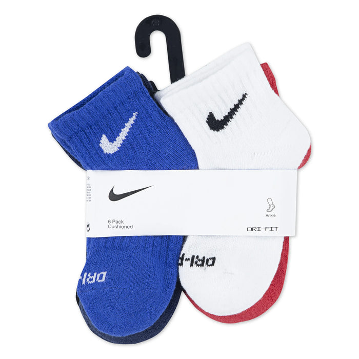 Nike Dri-FIT cushioned kids' ankle socks in blue, white, and red, shown in retail packaging.