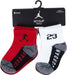 Jordan infant no slip ankle socks in red and white, size 12-24 months, displayed on hanger.