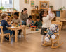 Solid wooden grand-ma classic kids rocking chair - children and teacher at daycare lifestyle