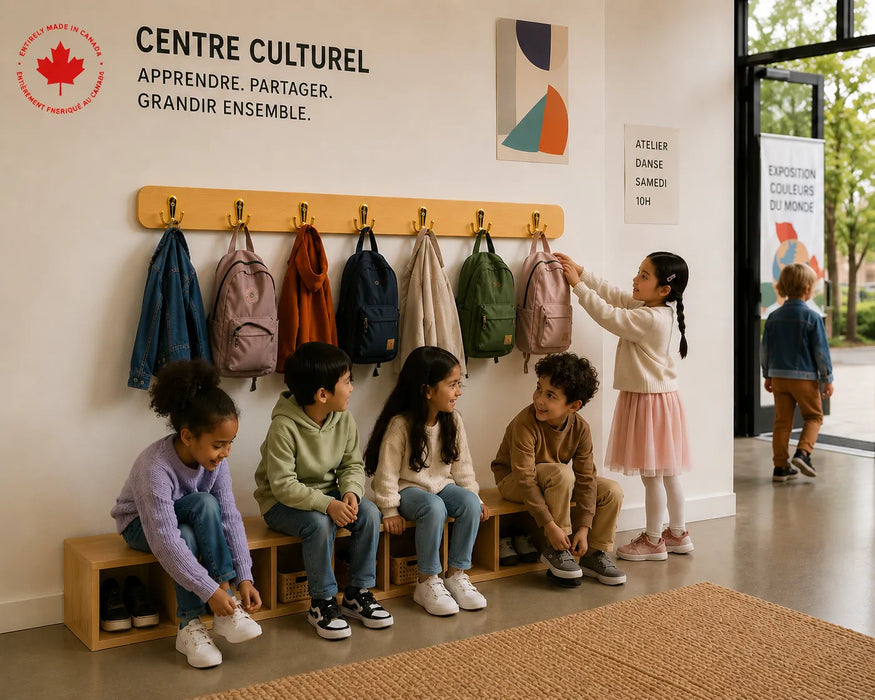 Children interacting with backpacks on the hard wood wall mount coat rack with hooks at a cultural center.
