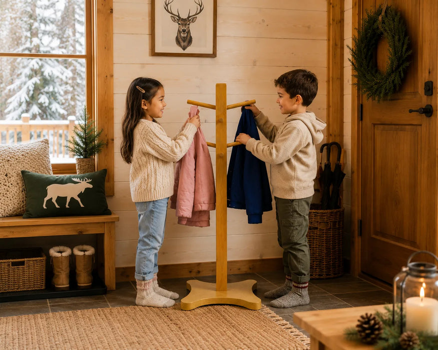 Solide maple wooden coat rack for kids with 2 children hanging their coats at the cottage