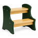 Two-step wooden stool with green frame and natural wood colour steps on a white background