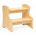 hard wooden step stool on a white background - natural colour