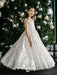 Teter Warm Angelica Lace Communion Dress worn by a girl standing in front of a decorated Christmas tree.