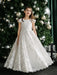 Angelica Lace Communion Dress shown on a girl standing in front of a decorated Christmas tree.