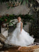 Teter Warm Cora Off White Communion Dress worn by a girl standing barefoot in a festive room.