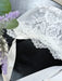 Teter Warm delicate baby bonnet with white lace and ribbon displayed on a dark surface.