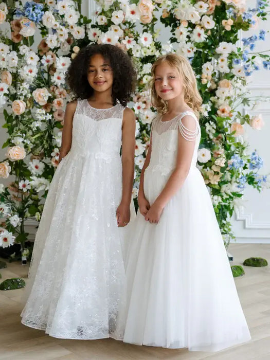 Teter Warm Hailey Lace Sequin Communion Dress on two girls standing in front of floral backdrop.