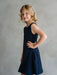 Teter Warm Rees sleeveless dark party dress worn by a child standing against a neutral background.