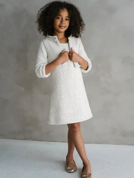 Teter Warm Sakura girls white tweed cropped jacket and dress modeled by a girl in a studio setting.