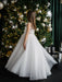 Teter Warm Thea Off-White Communion Dress worn by a girl standing beside a decorated Christmas tree.