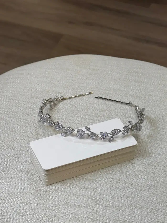 Teter Warm Trixie Blue & Silver Headpiece with crystal accents displayed on a textured surface.