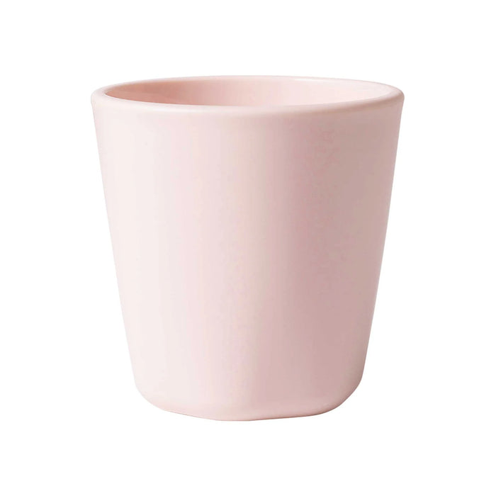 Tiny Twinkle kids plastic cup in light pink shown on a plain white background.