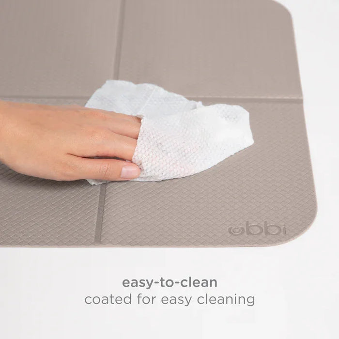 Ubbi® - On-The-Go Changing Mat Bag | Portable, Stylish & Practical