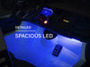 Voltz Toys F-450 ride-on car interior with spacious blue LED lighting and dashboard view.
