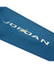 Blue Jordan kids' sweatshirt sleeve with white logo and yellow graphic on fabric.