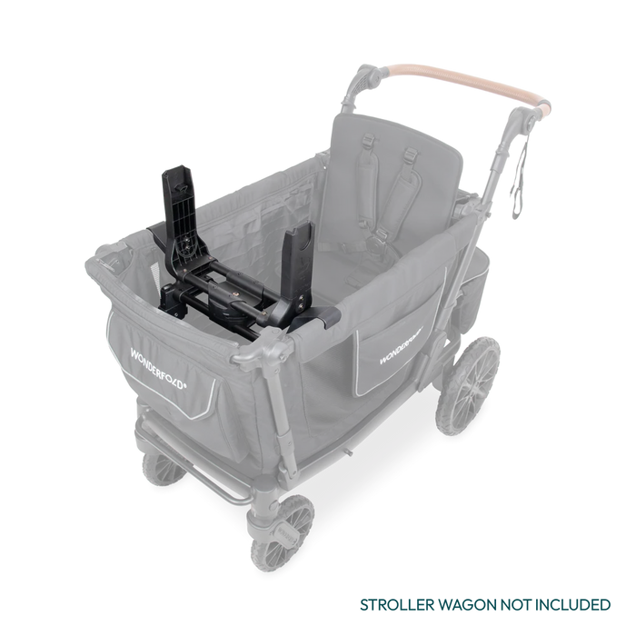 Wonderfold car seat adapter installed inside a black stroller wagon with harness straps visible.