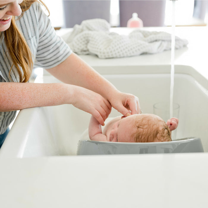 The First Years Sure Comfort™ Renewed Baby Bather – Baby Bath Support for Newborns & Infants