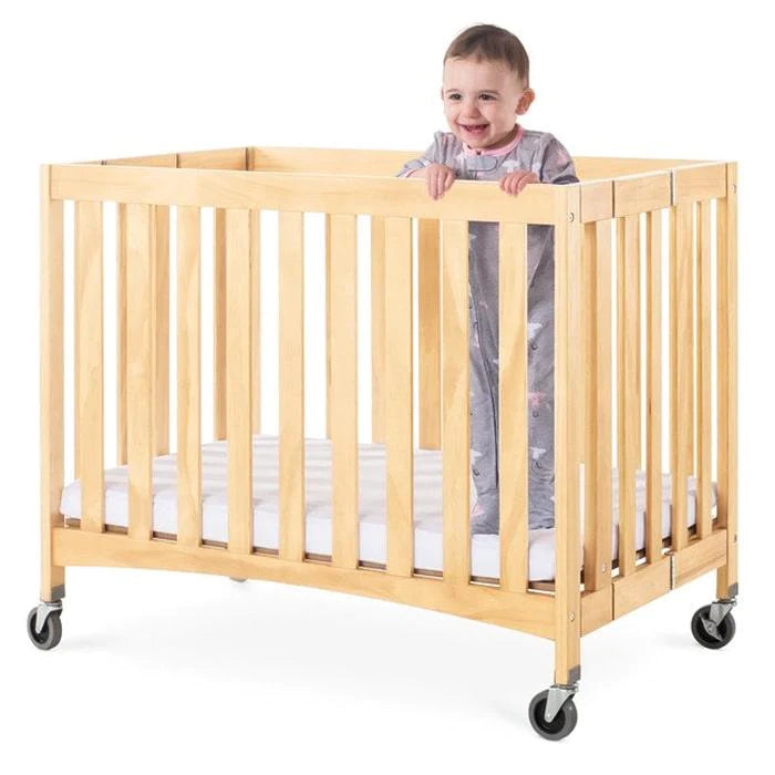 Foundations® - Foundations Travel Sleeper® Compact Folding Crib Slatted with Oversized Casters (Including Foam Mattress)