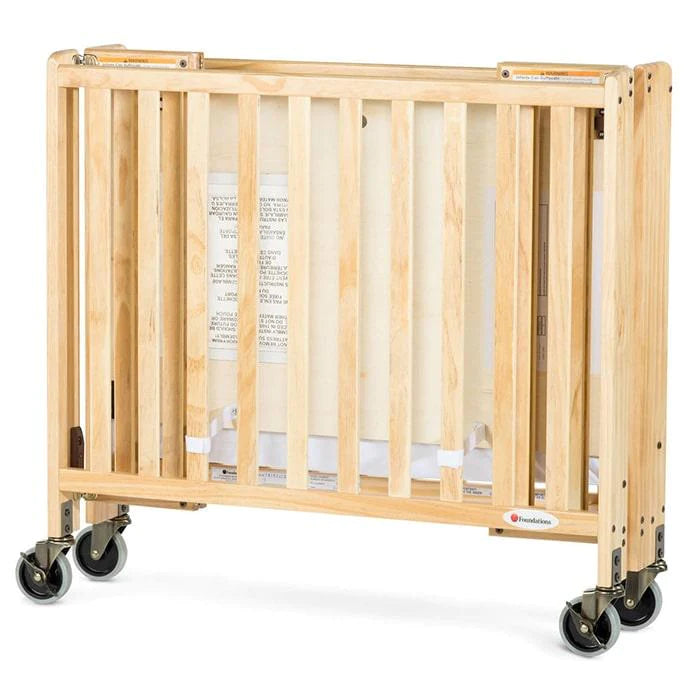 Foundations® - Foundations Travel Sleeper® Compact Folding Crib Slatted with Oversized Casters (Including Foam Mattress)