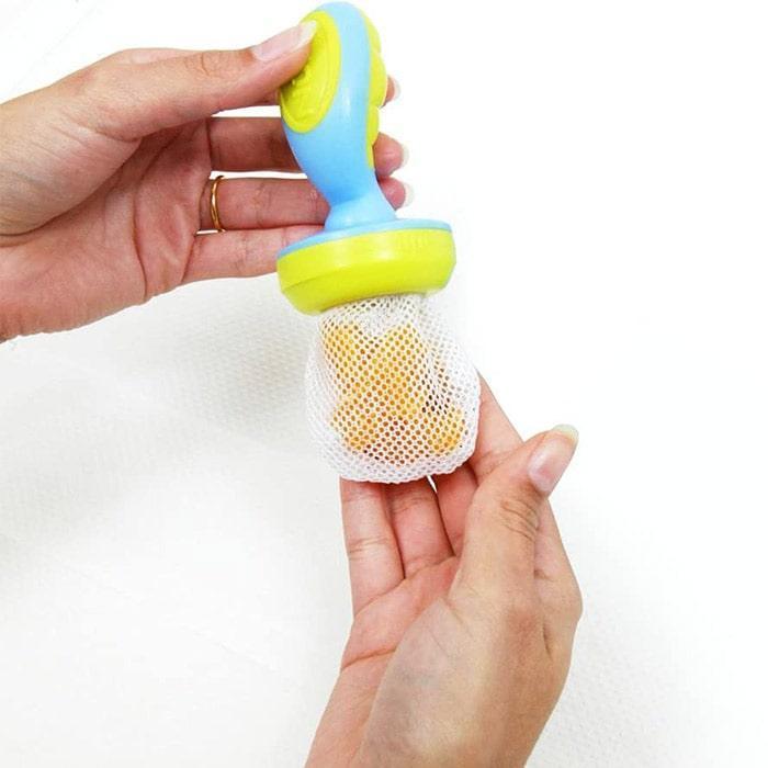 Nuby® - Nuby The Nibbler Feeder with Protection Cover - (1 Pack)