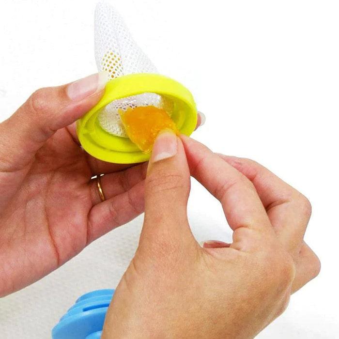 Nuby® - Nuby The Nibbler Feeder with Protection Cover - (1 Pack)